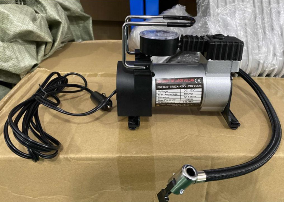 Portable 12v air compressor on a box