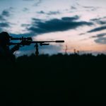 man hunting at night