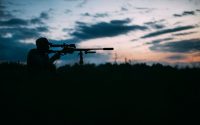 man hunting at night