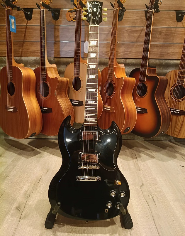 Black used guitar